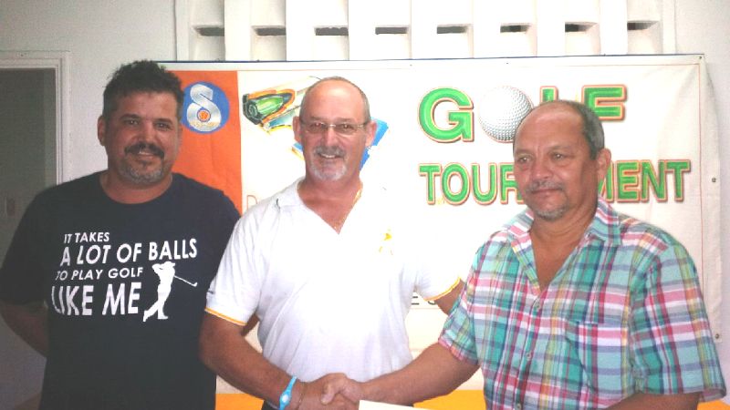 Winner Hansen (centre) is flanked by Mr Ernestine (right) and stand-in captain Deltel